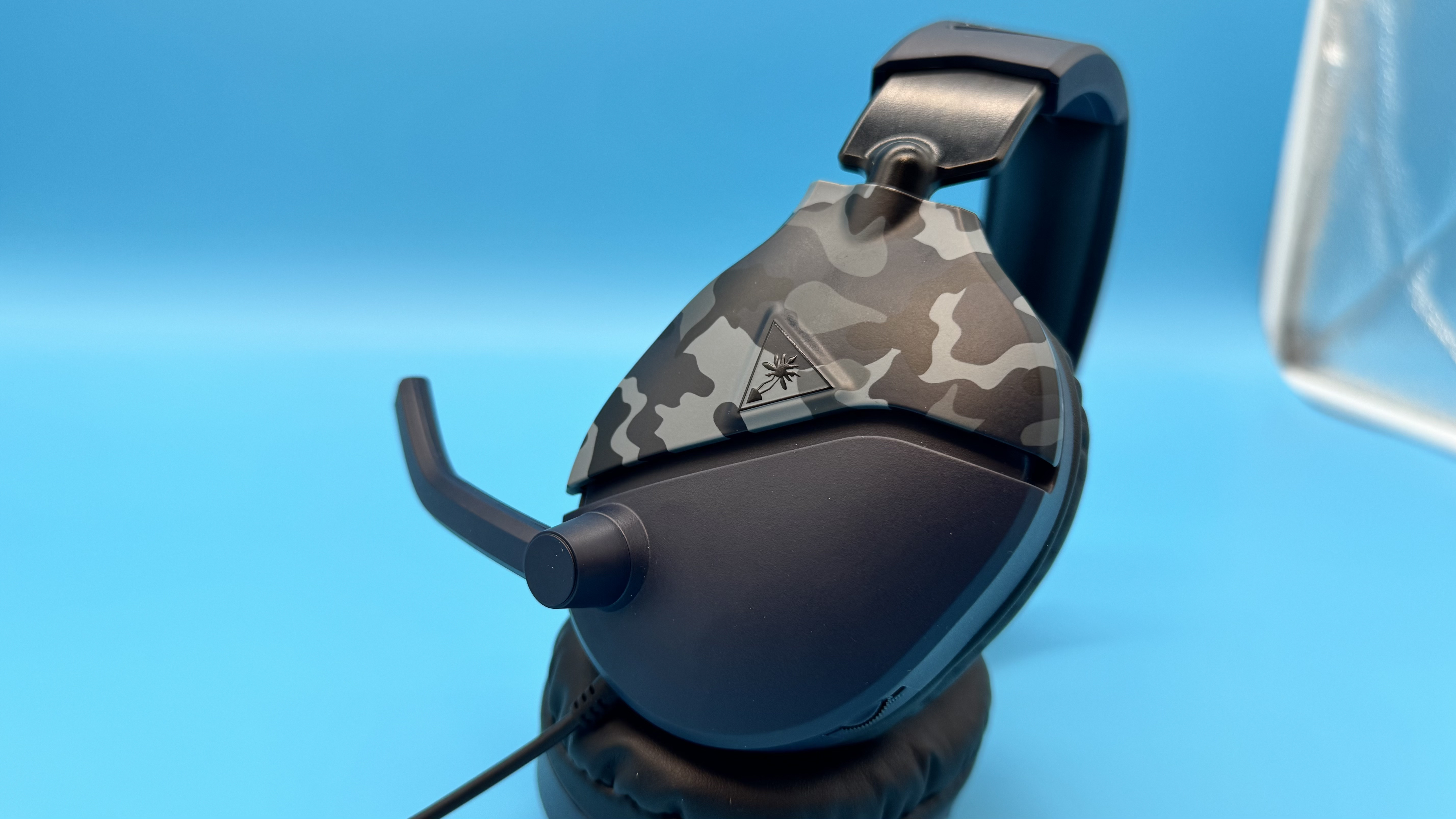 Turtle Beach Recon 70 gaming headset on a blue background