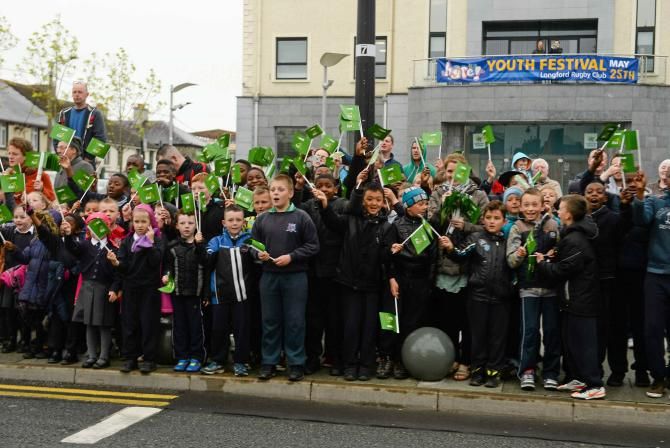 Longford school kids come out to cheers the riders during the second stage at the An Post Ras