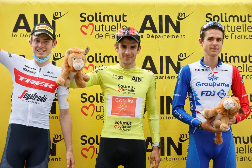 LLEX FRANCE AUGUST 11 LR Mattias Skjelmose Jensen of Denmark and Team Trek Segafredo on second place race winner Guillaume Martin of France and Team Cofidis and Rudy Molard of France and Team Groupama FDJ on third place pose on the podium ceremony after the 34th Tour de lAin 2022 Stage 3 a 131km stage from Plateau dHauteville to Llex 904m TDA22 on August 11 2022 in Llex France Photo by Bas CzerwinskiGetty Images