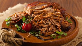 Pulled pork on chopping board