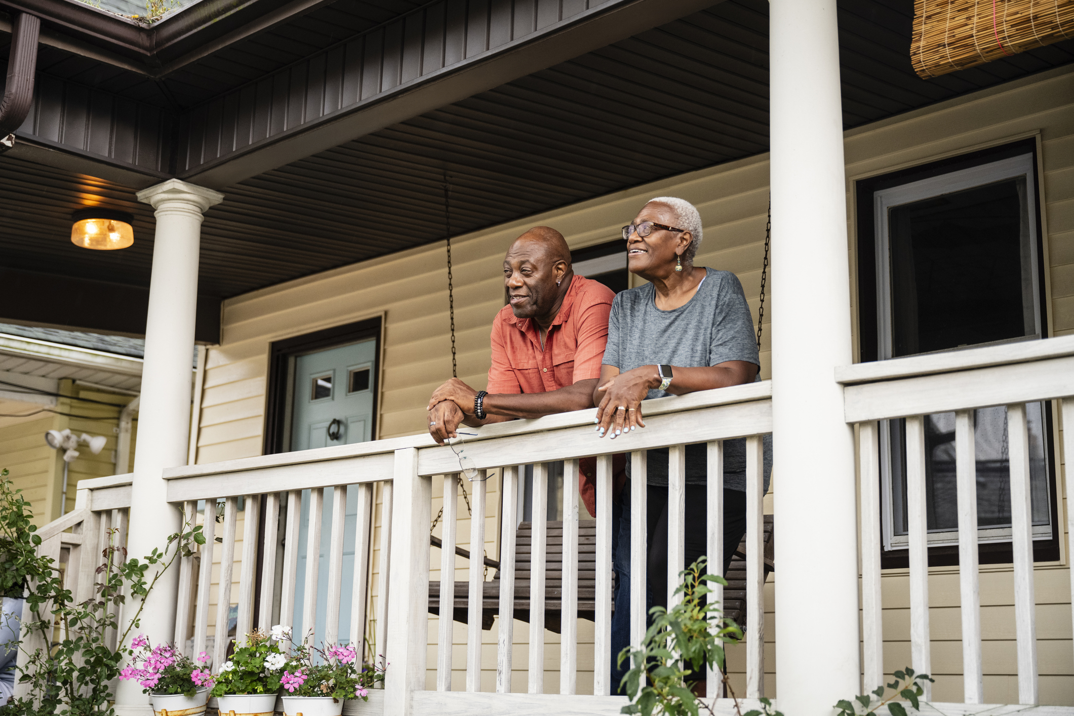 Older couple relaxing on a porch.