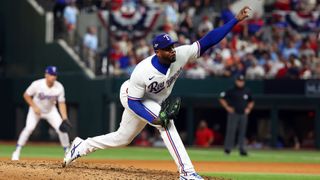 Aroldis Chapman #45 of the Texas Rangers pitches in the eighth inning against the Baltimore Orioles during Game Three of the Division Series at Globe Life Field on October 10, 2023 in Arlington, Texas