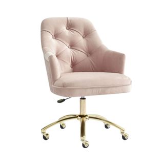 A dusky pink tufted button upholstered chair with a gold steel swivel base