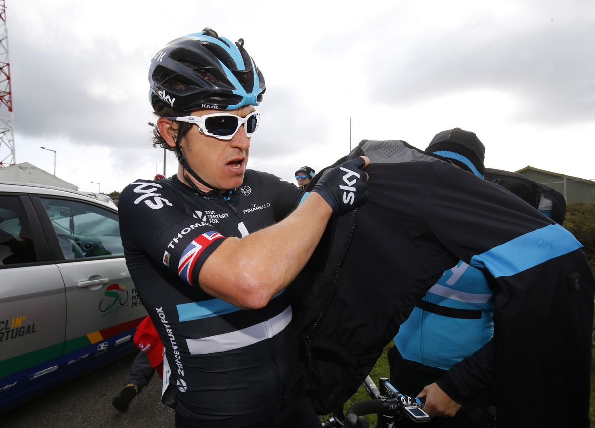 Geraint Thomas (Sky) was quick to bundle up after a cold, windy finish