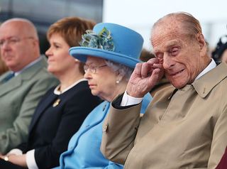 Queen Elizabeth II, the Duke of Edinburgh and First Minister Nicola Sturgeon on the Queensferry Crossing during the official opening of the new bridge across the Firth of Forth. (©Jane Barlow/PA)