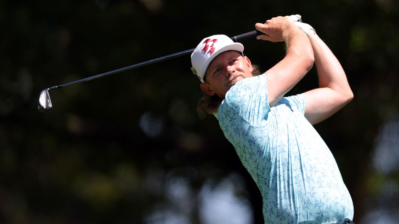 Cameron Smith of Australia plays his shot from the fourth tee during the third round of the 2024 Masters.