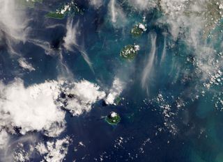 A wide view of the eruption of the volcano Anak Krakatua on Sunda Strait between Java and Sumatra as seen on April 13, 2020 by the Landsat 8 satellite.
