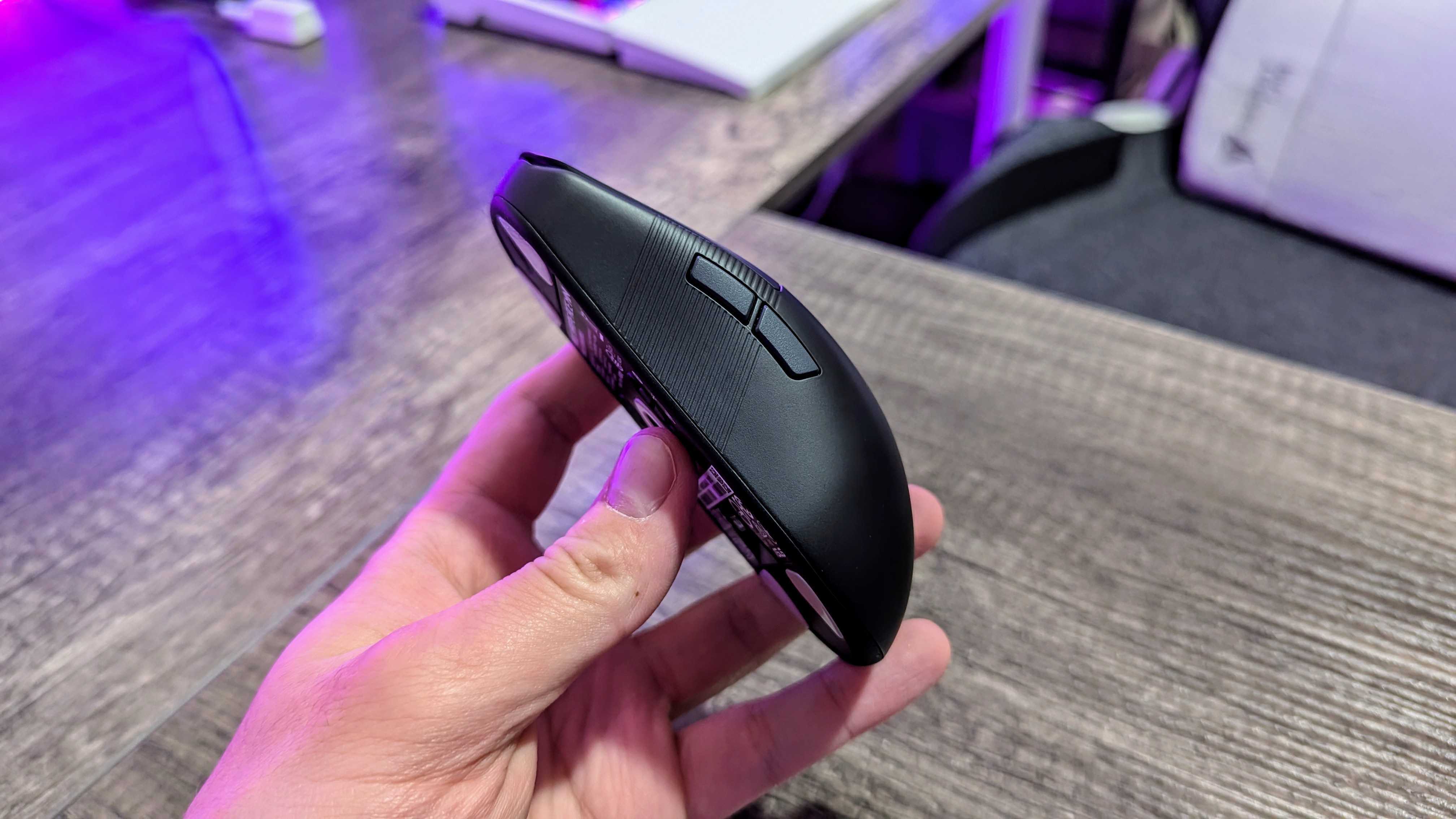 Image of the ASUS ROG Harpe Ace Mini wireless gaming mouse.