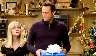 Four Christmases cast still with present