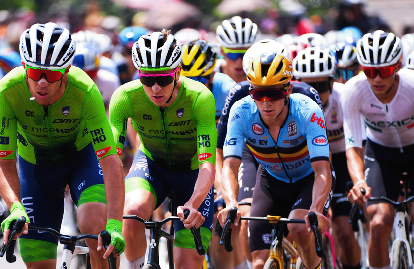 KIGALI, RWANDA - SEPTEMBER 28: (L-R) Tadej Pogacar and Team Slovenia and Remco Evenepoel and Team Belgium compete during the 98th UCI Cycling World Championships Kigali 2025, Men Elite Road Race a 267.5km race from Kigali to Kigali on September 28, 2025 in Kigali, Rwanda. (Photo by Zac Williams - Pool/Getty Images)