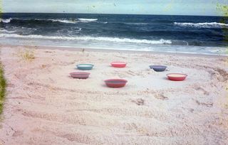 7 colorful plates in beach