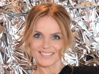 Geri Horner smiles for the camera on the red carpet