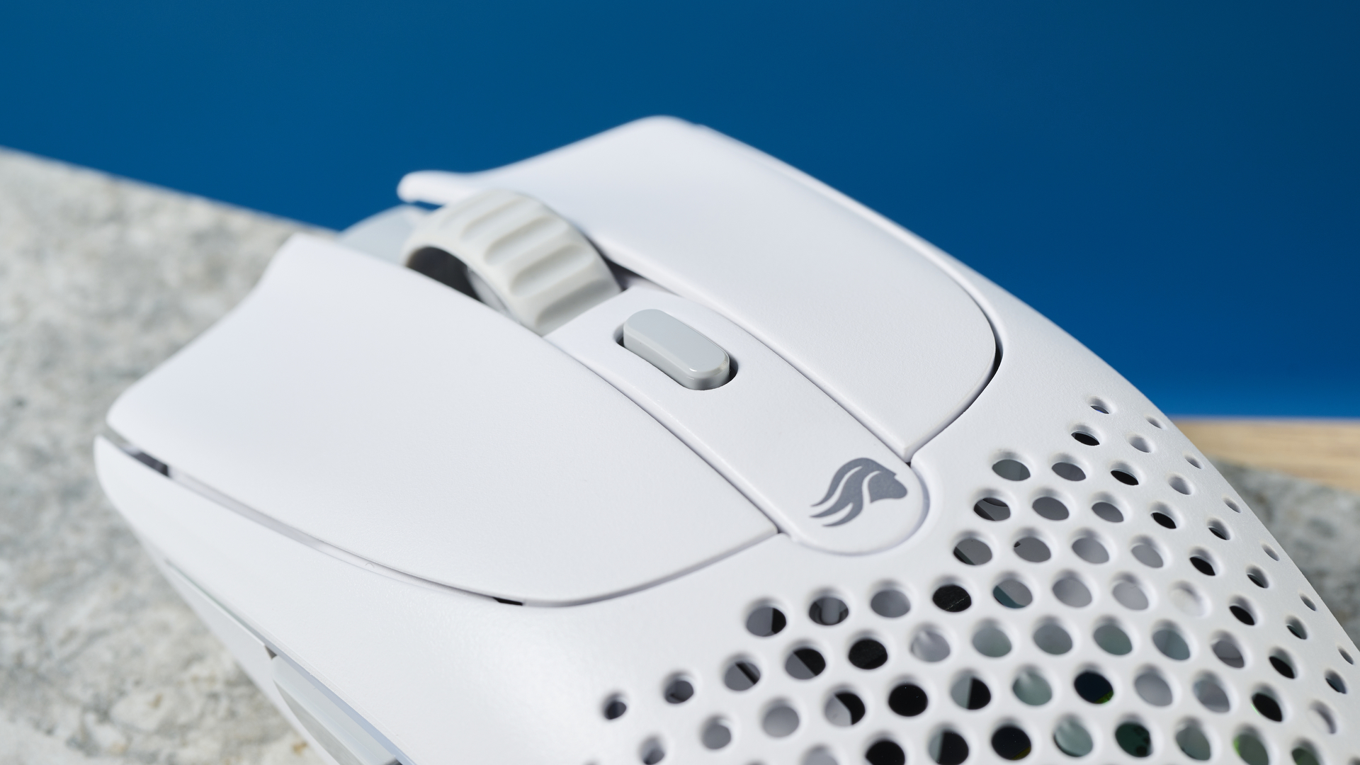A white Glorious Model O 2 wireless gaming mouse