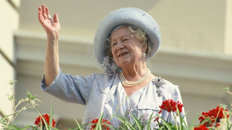 he Queen Mother waves to well-wishers during the celebration of her 90th birthday