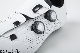 A close up of the Boa Dials and perforations. The lower dial is useful for adjusting forefoot volume.