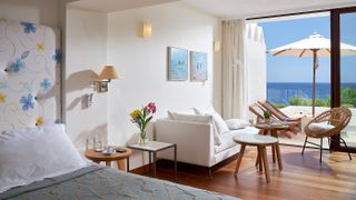 A classic junior suite with sea view at St Nicolas Bay Resort Hotel & Villas in Crete