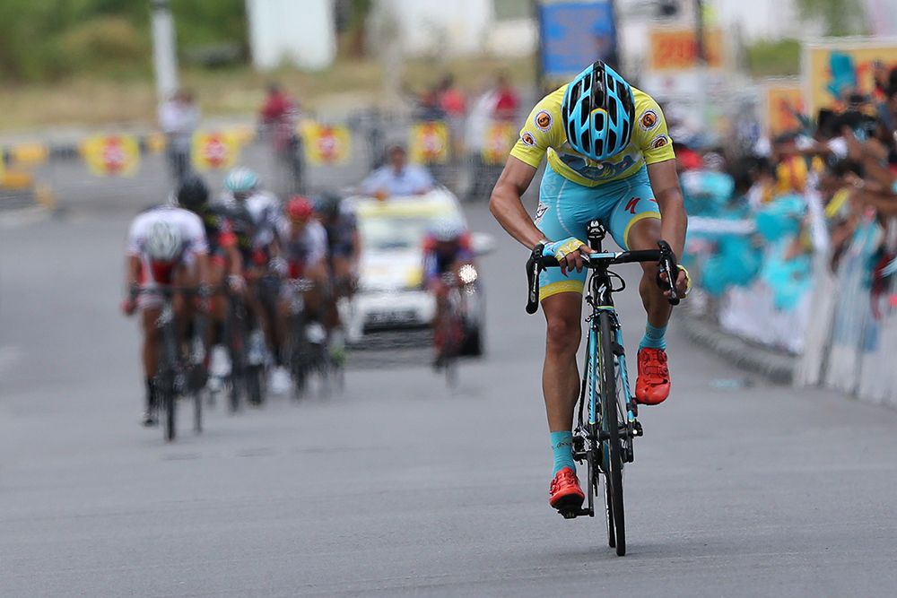 Miguel Angel Lopez crosses the line after losing time