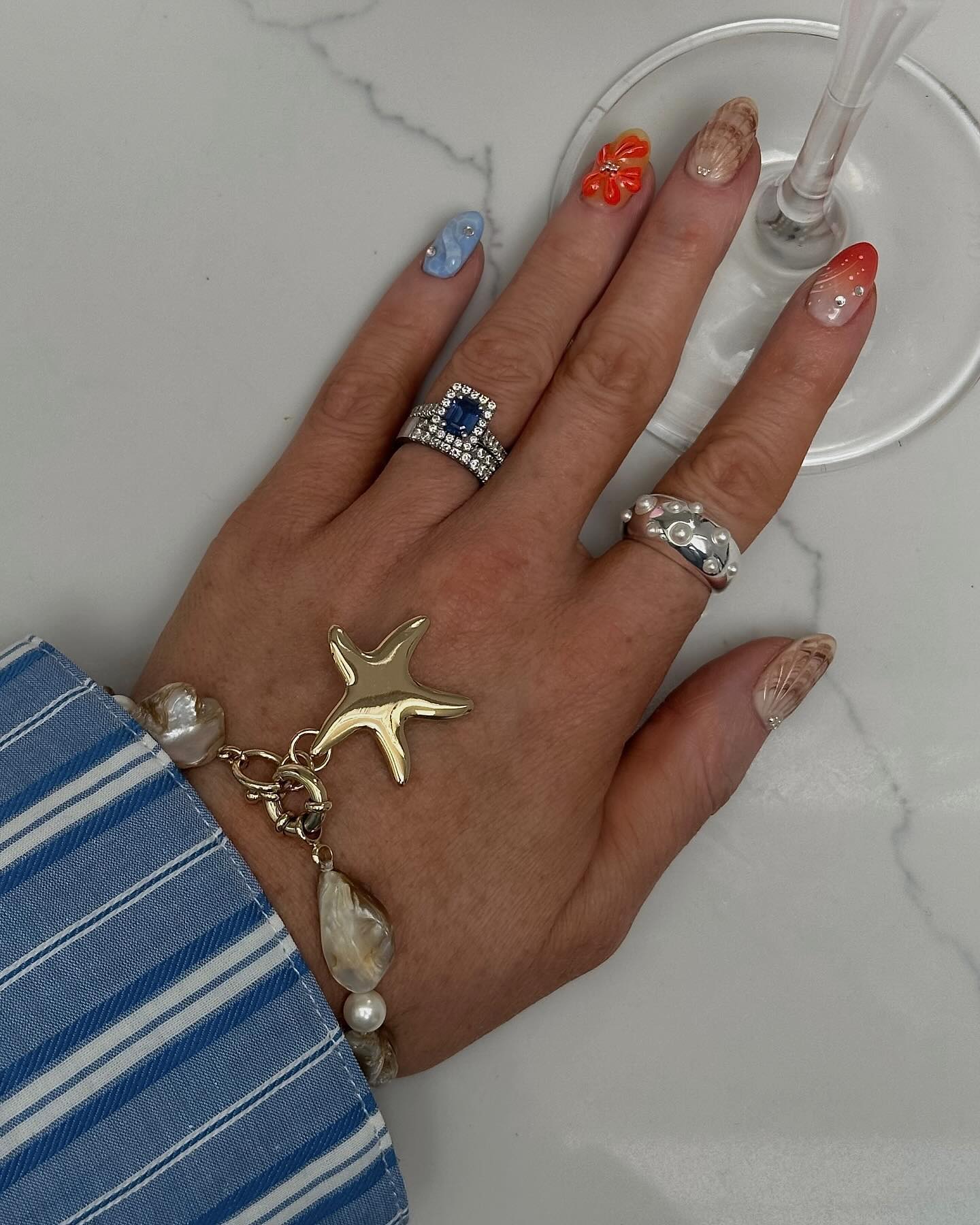 An image of @rebeccaferrazwyatt wearing one of the biggest summer jewellery trends for 2025.