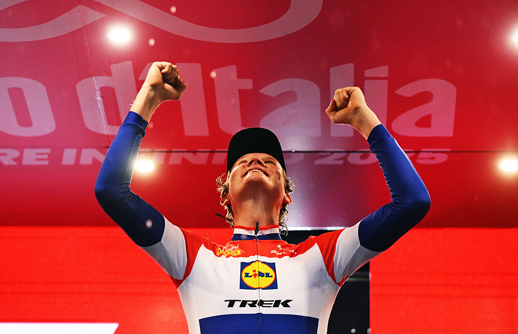 Daan Hoole celebrates at podium as stage 10 winner during the 108th Giro d&#039;Italia 2025