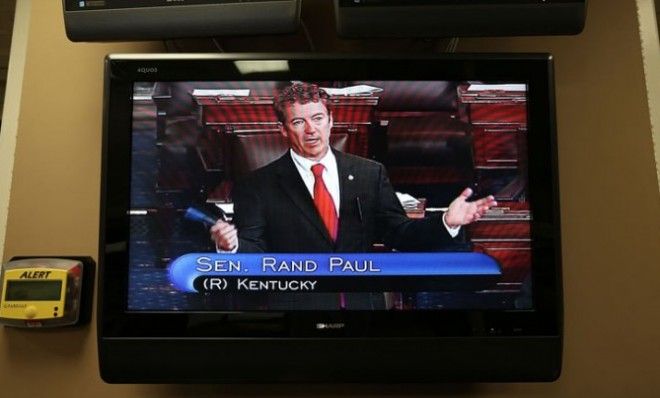 Sen. Rand Paul, as seen through a TV monitor, participates in his &amp;quot;talking filibuster&amp;quot; on March 6.