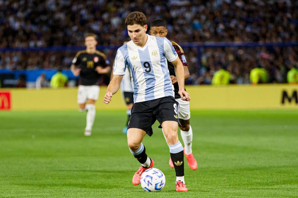 Julian Alvarez of Argentina runs with the ball during the FIFA World Cup 2026 South American Qualifier match between Argentina and Peru at Estadio Alberto J. Armando on November 19, 2024 in Buenos Aires, Argentina. 