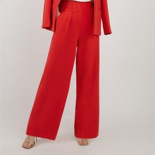 close up of red wide leg trousers