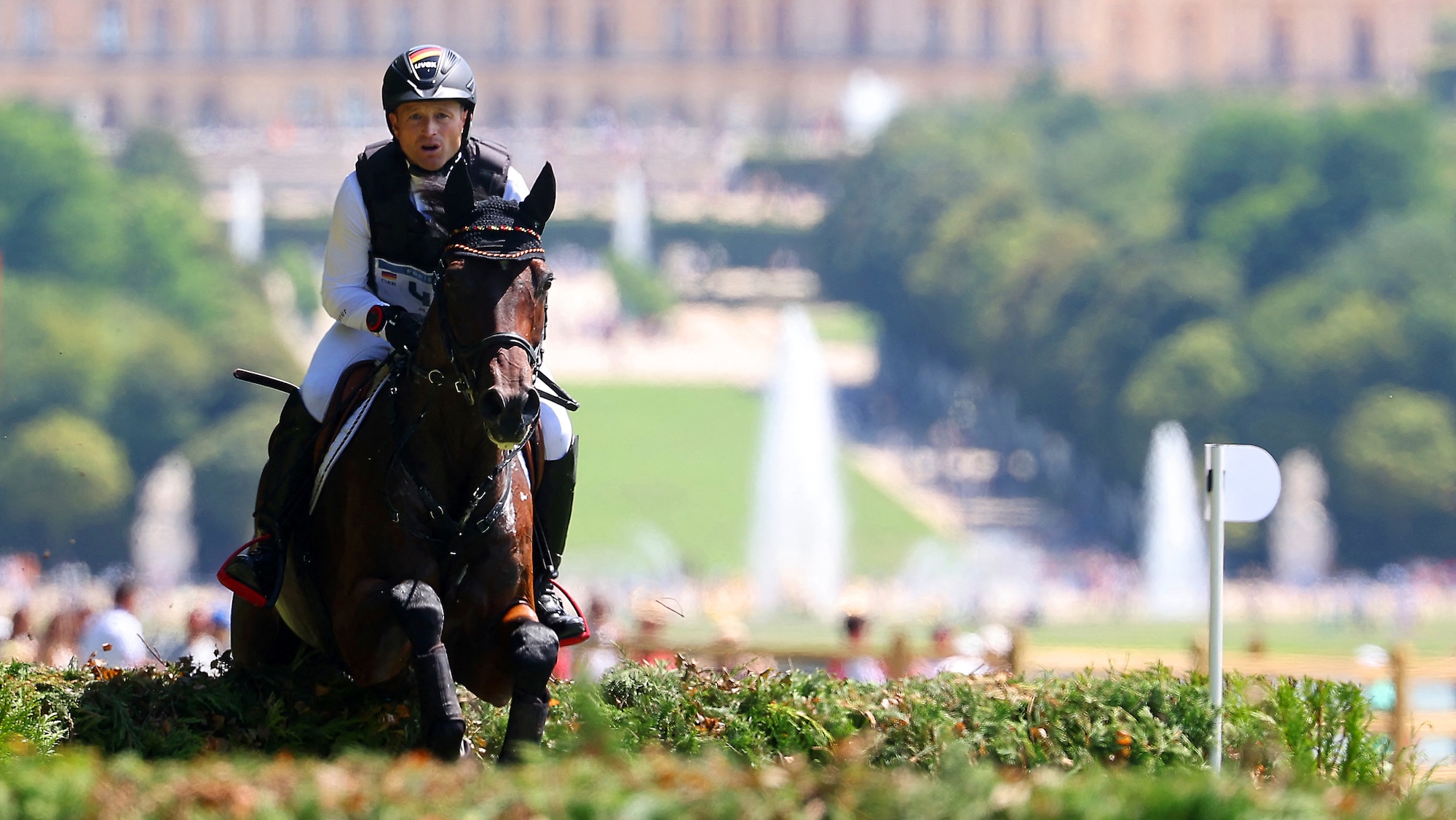 Germany's Michael Jung with horse Chipmunk FRH competes at the Paris 2024 Olympic Games at the Chateau de Versailles. (Photo by Pierre-Philippe MARCOU / AFP)