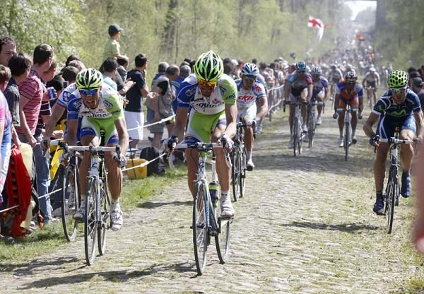 Liquigas-Cannondale riders take in the Arenberg cobbles.