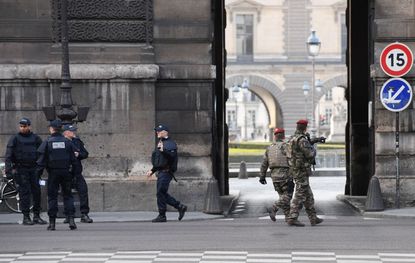 French law enforcement responds to attack at the Louvre museum
