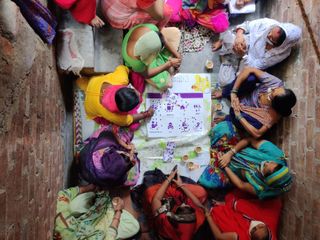 Women discussing at Social Design Collaborative's 'Main Bhi Dilli’ civic campaign