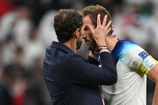 England's coach #00 Gareth Southgate and England's forward #09 Harry Kane react at the end of the Qatar 2022 World Cup quarter-final football match between England and France at the Al-Bayt Stadium in Al Khor, north of Doha, on December 10, 2022.