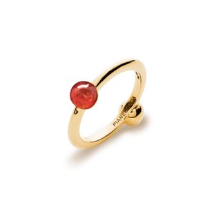Gold ring with red spherical stone