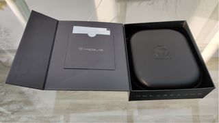 Image shows the Treblab Z7 Pro headphones case inside the packaging box.