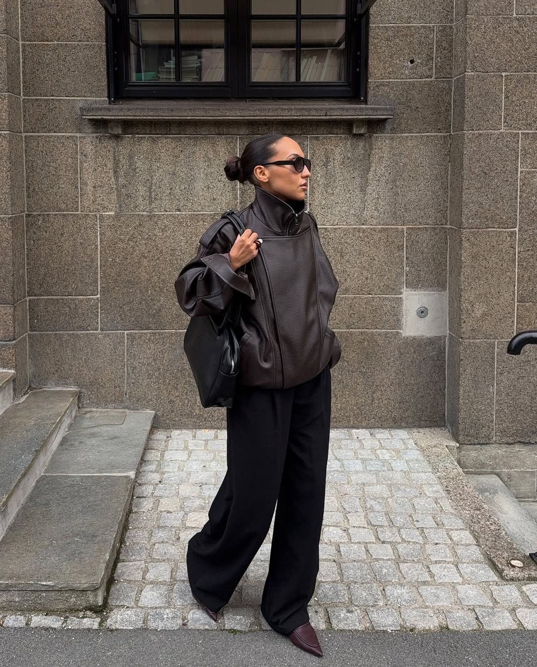 woman wearing brown maroon color trend fall 2025