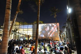 New World Symphony extends its concert experience to the park outside the facility, with a 100-by-75-foot projection wall and 160-channel Meyer Sound audio system.