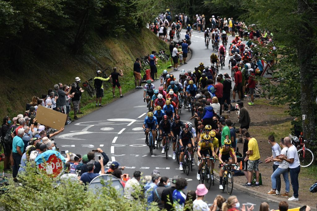The pack rides during the 13th stage of the 107th edition of the Tour de France cycling race 191 km between ChatelGuyon and Puy Mary on September 11 2020 Photo by Marco Bertorello AFP Photo by MARCO BERTORELLOAFP via Getty Images