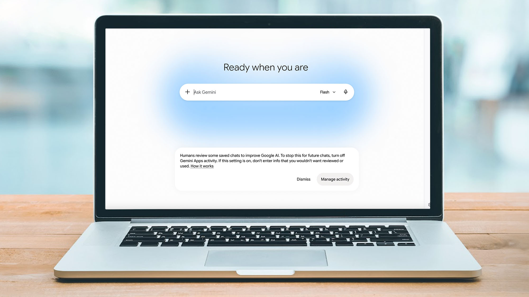 Gemini with a warning message on a laptop screen.
