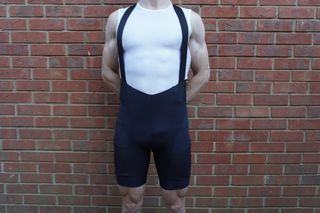 Male cyclist wearing the Endura GV500 Reiver Bib Shorts which are among the best cargo bib shorts for cycling