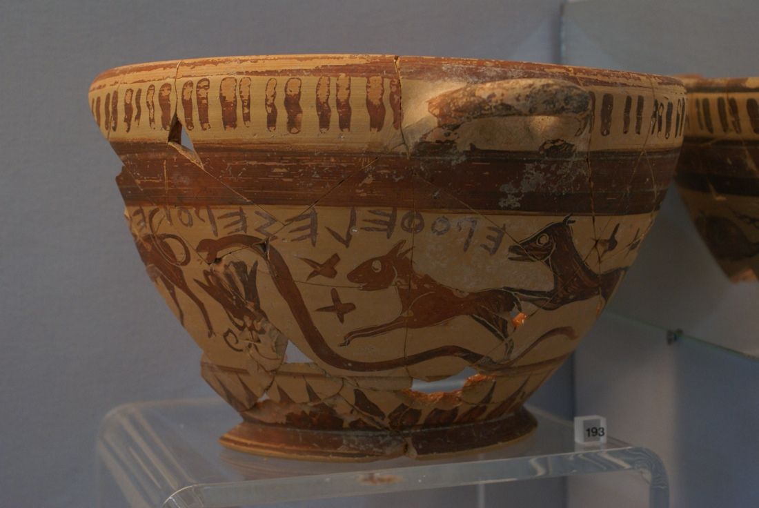 A two-handled wine cup may hold some of the earliest Greek depictions of the constellations. Here, a bull, snake, rabbit/small dog and large dog decorations.