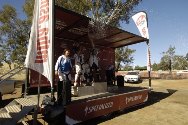 The women's podium tried to settle the dust with a little bubbly.