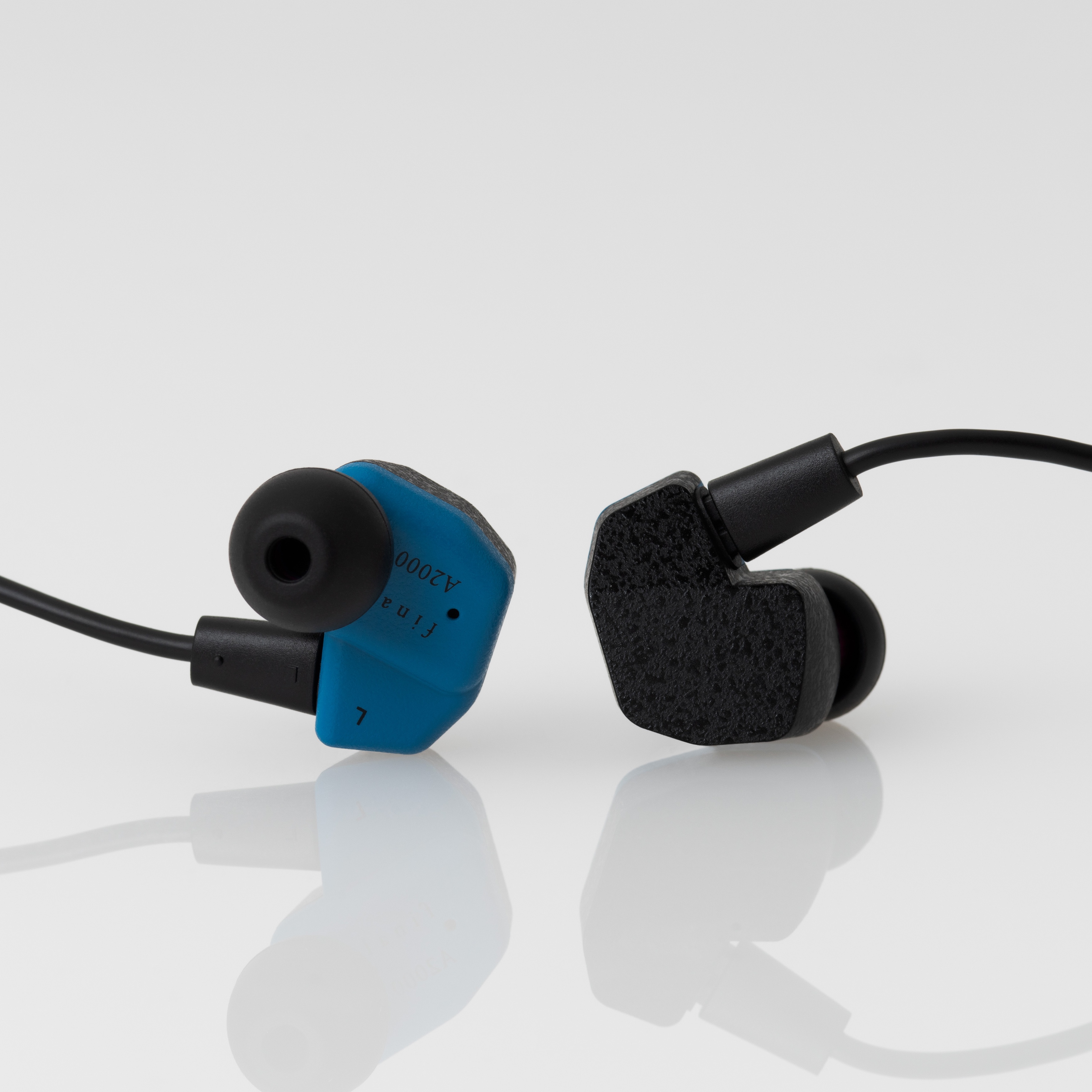 Final Audio A2000 IEMs over white background