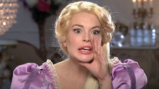Lindsay Lohan dressed as Rapunzel whispering to the camera on SNL.