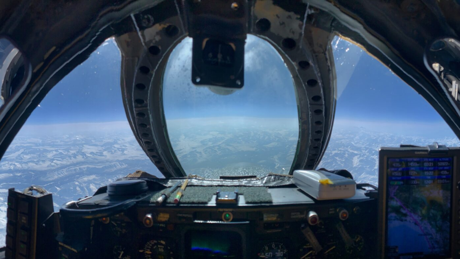 The view of Earth&#039;s atmosphere from inside the cockpit of NASA’s WB57 research aircraft.