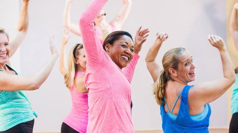 A group of older women enjoying a Zumba dance exercise class