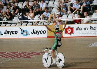 Amy Cure celebrates after winning the U19 women's individual pursuit