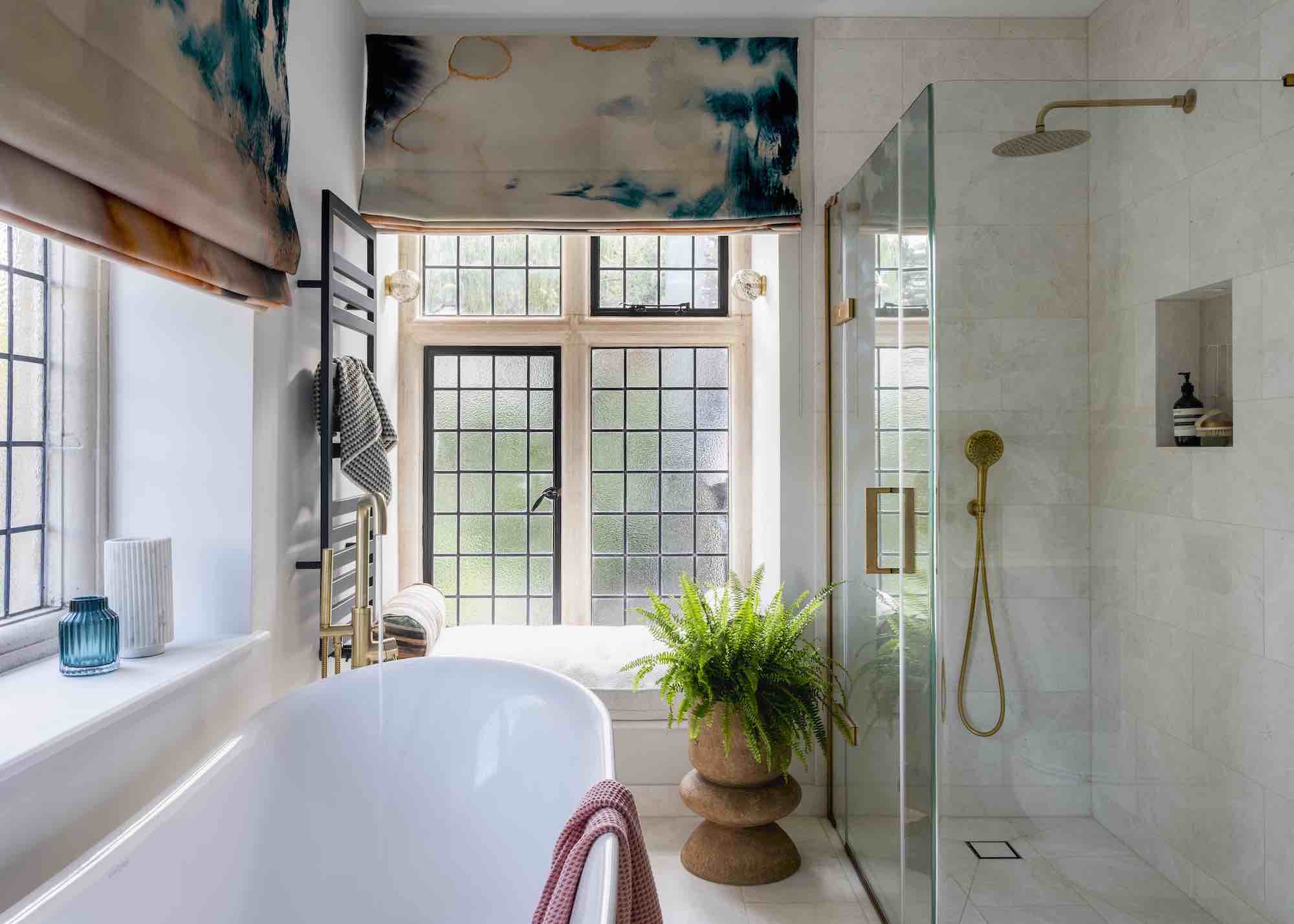 bathroom with leaded windows and walk in shower and bath