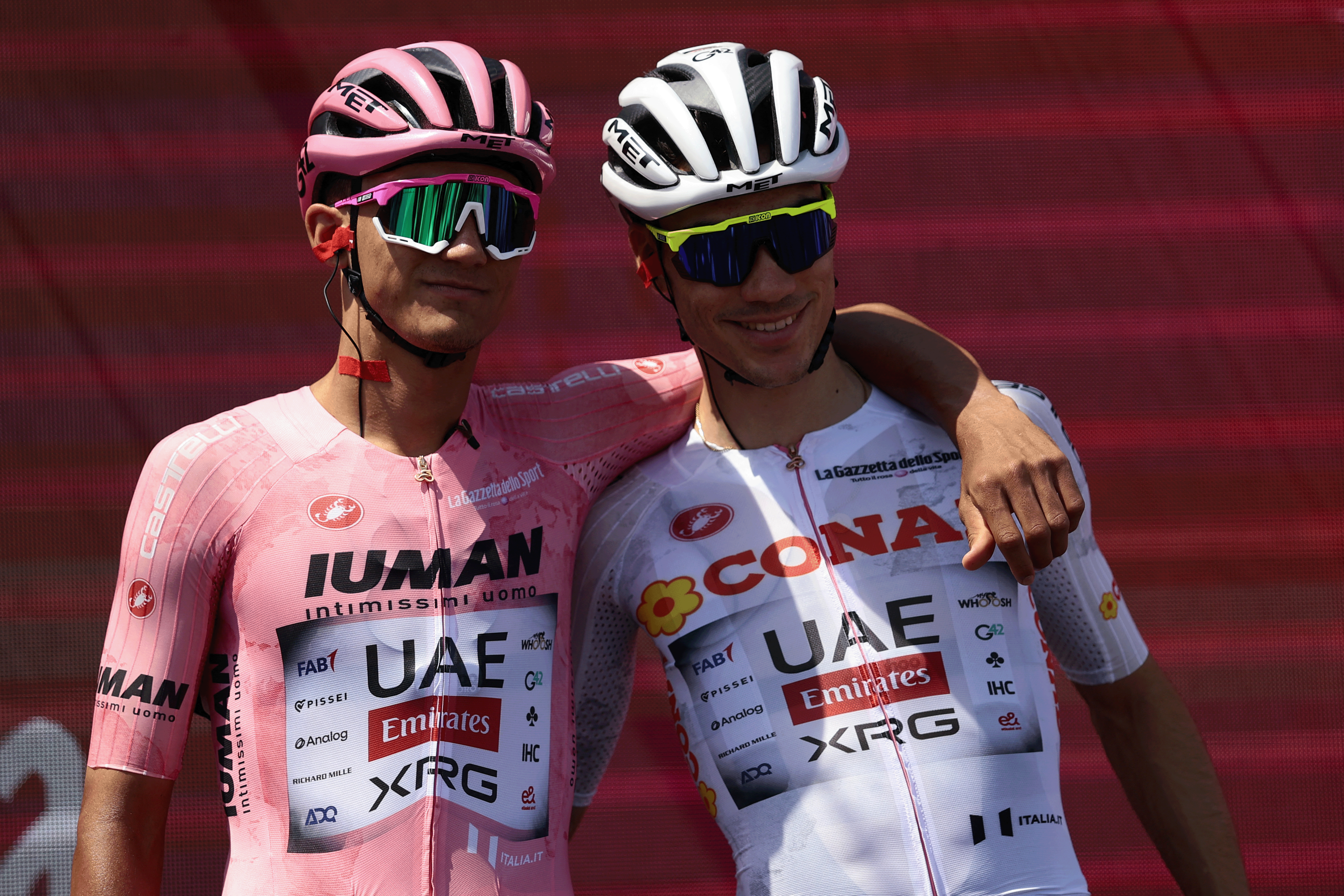 Pink Jersey UAE Team Emirates XRG&#039;s Mexican rider Isaac Del Toro poses with teammate UAE Team Emirates XRG&#039;s Spanish rider Juan Ayuso before the 11th stage of the 108th Giro d&#039;Italia cycling race of 186kms from Viareggio to Castelnovo ne&#039; Monti on May 21, 2025. (Photo by Luca Bettini / AFP) (Photo by LUCA BETTINI/AFP via Getty Images)