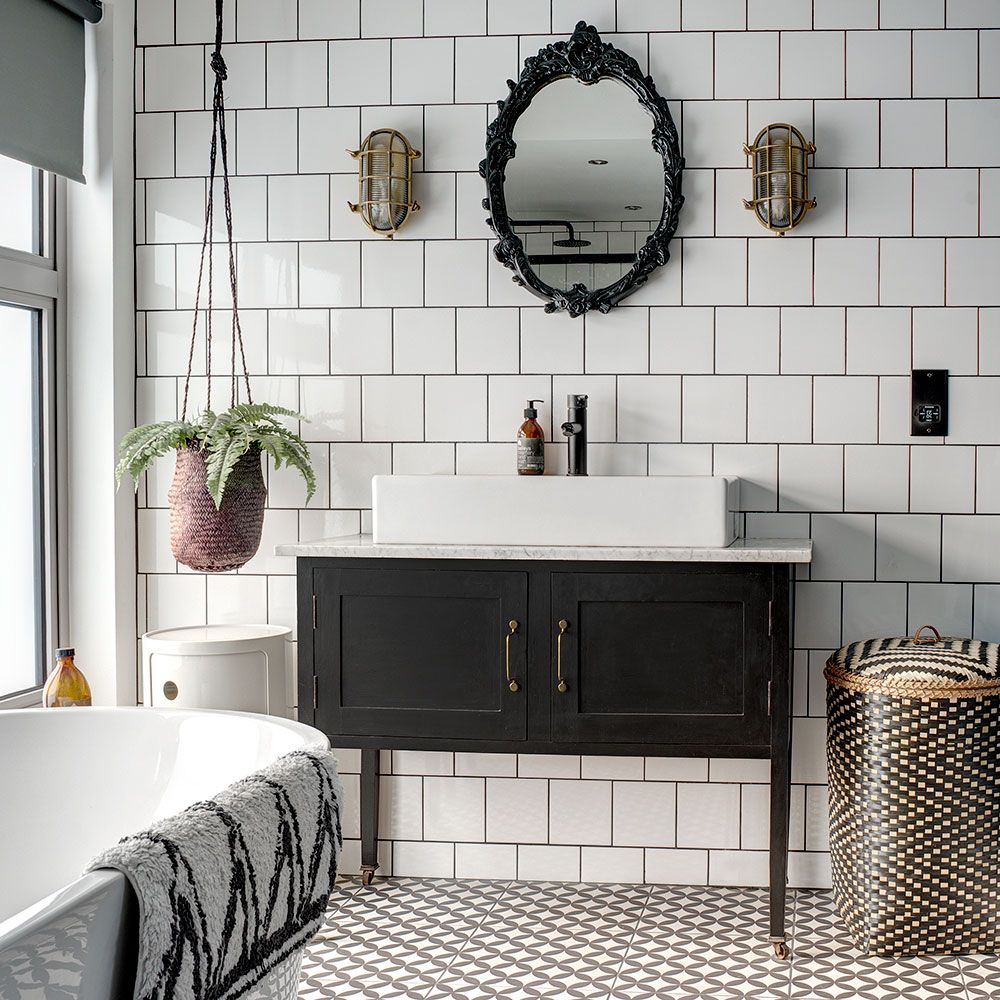 Monochrome bathroom makeover with blue wall and black shower frame ...