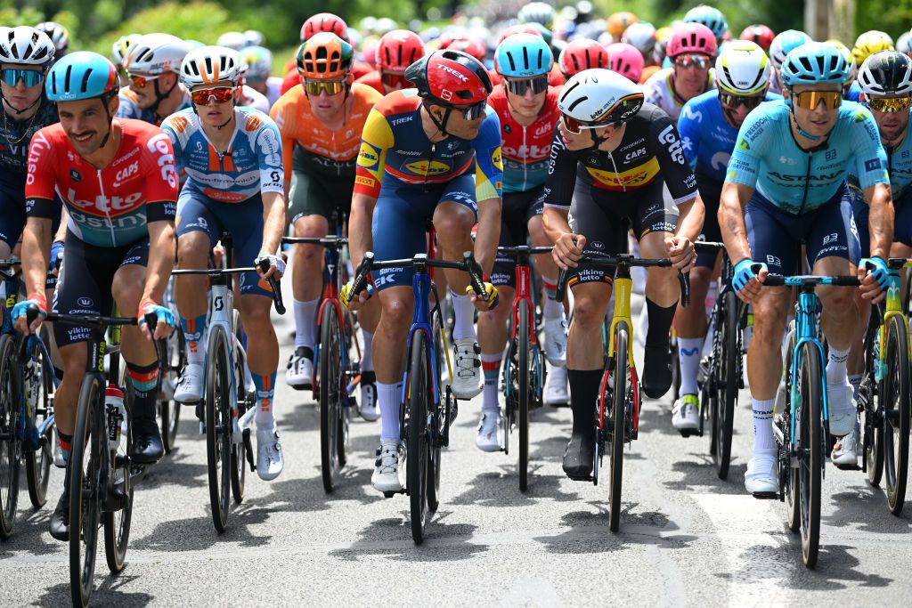 DIJON FRANCE JULY 04 LR Jasper Stuyven of Belgium and Team Lidl Trek Arnaud De Lie of Belgium and Team Lotto Dstny compete during the 111th Tour de France 2024 Stage 6 a 1635km stage from Macon to Dijon UCIWT on July 04 2024 in Dijon France Photo by Dario BelingheriGetty Images