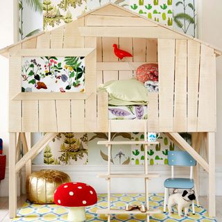 kids room with wooden sloping roof bed